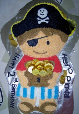 Radio Clash – I AM 2! Happy Birthday to me! Happy Birthday to ME! Photo is a child's pirate cake