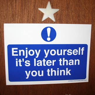 Sign saying 'Enjoy Yourself It's Later Than You Think' - Specials Lumpy Radio Clash 111: Eclectic Kettle Special 
