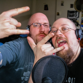 Radio Clash 112: Ghey METAL Show #2 – LIVE! eclectic mashup music podcast metal rock heavy cover shows Scott and Tim making the devil's horns