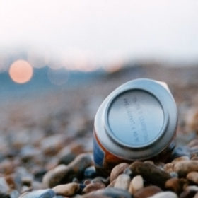 digitaldebris 2 cover - photo by Tim Baker of a can on Brighton Beach for digital debris podcast