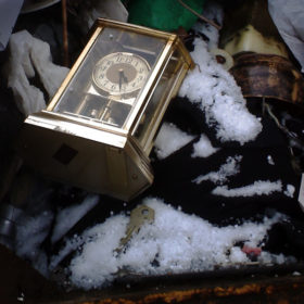 RC 184: Quiet Storm eclectic music mashup weather podcast cover shows my mother's carriage clock in skip with snow