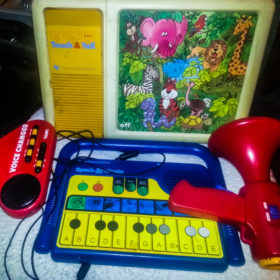 RC 249: A is For Acid Accordion (Odds and Sods #15) eclectic music mashup podcast cover is electronic musical toys Speak and Music Speak and Touch Texas Instruments