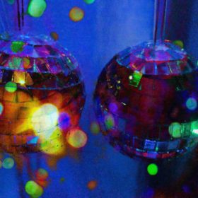 RC 295: Balls To Xmas eclectic mix of Christmas music and mashups - two tiny disco balls with fairy lights