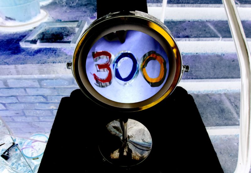 RC 300: Mirror Universe - the good twin of 301, sign in a mirror saying 300 with a reversed background. Celebration podcast of eclectic mix of music and mashups of reaching 300 - alternate version